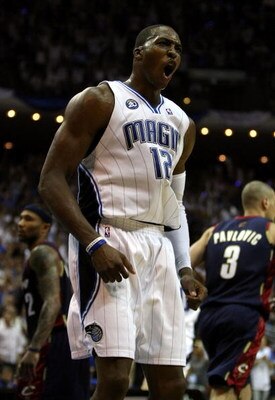ORLANDO, FL - MAY 30:  Dwight Howard #12 of the Orlando Magic reacts after a play late in the game against the Cleveland Cavaliers in Game Six of the Eastern Conference Finals during the 2009 Playoffs at Amway Arena on May 30, 2009 in Orlando, Florida. NO