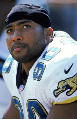 17 Oct 1999:  Tony Brackens #90 of the Jacksonville Jaguars looks on from the bench during the game against the Cleveland Browns at the Alltell Stadium in Jacksonville, Florida. The Jaguars defeated the Browns 42-7. Mandatory Credit: Scott Halleran  /Alls