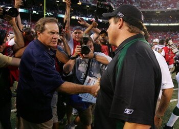 EAST RUTHERFORD, NJ - SEPTEMBER 14: Head coach Eric Mangini (R) of the New York Jets congratulates head coach Bill Belichick of the New England Patriots after their game on September 14, 2008 at Giants Stadium in East Rutherford, New Jersey. The Patriots 