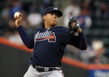 NEW YORK - MAY 12:  Jair Jurrjens #49 of the Atlanta Braves throws a pitch against the New York Mets on May 12, 2009 at Citi Field in the Flushing neighborhood of the Queens borough of New York City. The Mets defeated the Braves 4-3 in ten innings.  (Phot