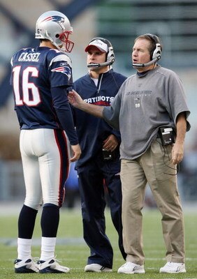 FOXBORO, MA - NOVEMBER 09:  Head coach Bill Belichick and offensive coordinator Josh McDaniels talks with Matt Cassel #16 of the New England Patriots during a time out in the fourth quarter against the Buffalo Bills on November 9, 2008 at Gillette Stadium