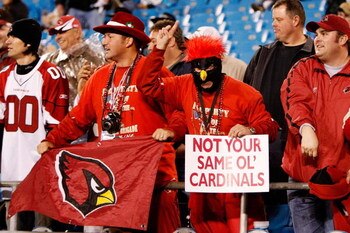 CHARLOTTE, NC - JANUARY 10:  Fans of the Arizona Cardinals hold a sign that reads 'Not Your Same Ol' Cardinals' during the game against the Carolina Panthers during the NFC Divisional Playoff Game on January 10, 2009 at Bank of America Stadium in Charlott