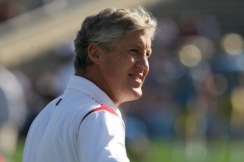 PASADENA, CA - DECEMBER 06:  Head coach Pete Carroll of the USC Trojans smiles during warm ups before the game against the UCLA Bruins on December 6, 2008 at the Rose Bowl in Pasadena, California.  (Photo by Stephen Dunn/Getty Images)