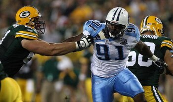 GREEN BAY, WI - AUGUST 28: Ryan Keenan #51 of the Green Bay Packers attempts to block Jason Jones #91 of the Tenessee Titans on August 28, 2008 at Lambeau Field in Green Bay, Wisconsin. The Titans defeated the Packers 23-21. (Photo by Jonathan Daniel/Gett