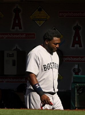 ANAHEIM, CA - MAY 14:  David Ortiz #34 of the Boston Red Sox walks in the dugout after grounding out for the final out with the bases loaded in the 12th inning against  the Los Angeles Angels of Anaheim on May 14, 2009 at Angel Stadium in Anaheim, Califor