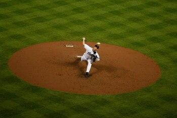 HOUSTON - APRIL 06:  Roy Oswalt #44 of the Houston Astros pitches against the Chicago Cubs on Opening Day on April 6, 2009 at Minute Maid Park in Houston, Texas.  (Photo by Chris Graythen/Getty Images)