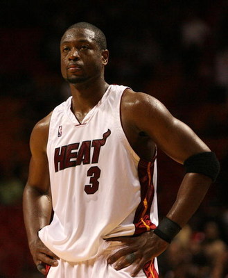MIAMI - APRIL 27: Dwyane Wade #3 of the Miami Heat reacts with less than a minute to play in the game against the Atlanta Hawks during Game Four of the Eastern Conference Quarterfinals of the 2009 NBA Playoffs at American Airlines Arena on April 27, 2009