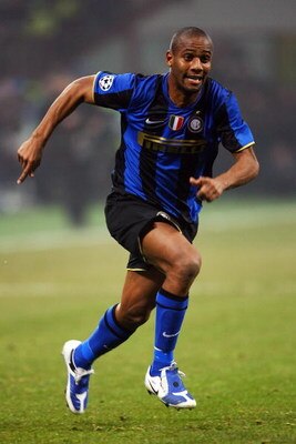 MILAN, ITALY - FEBRUARY 24:  Maicon of Inter Milan runs after the ball during the UEFA Champions League, Round of Last 16, First Leg match between Inter Milan and Manchester United at the San Siro Stadium on February 24, 2009 in Milan, Italy.  (Photo by A