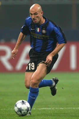 MILAN, ITALY - OCTOBER 22:  Esteban Cambiasso of Inter Milan runs with the ball during the UEFA Champions League Group B match between Inter Milan and Anorthosis Famagusta at the Stadio Giuseppe Meazza on October 22, 2008 in Milan, Italy.  (Photo by Hamis