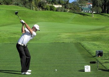 PACIFIC PALISADES, CA - FEBRUARY 19: Dustin Johnson hits his tee shot on the 18th hole during the first round of the Northern Trust Open on February 19, 2009 at Riviera Country Club in Pacific Palisades, California.  (Photo by Stephen Dunn/Getty Images)