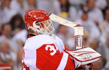 PITTSBURGH - JUNE 02:  Goaltender Chris Osgood #30 of the Detroit Red Wings looks on against the Pittsburgh Penguins during Game Three of the 2009 NHL Stanley Cup Finals on June 2, 2009 at Mellon Arena in Pittsburgh, Pennsylvania.  (Photo by Harry How/Get