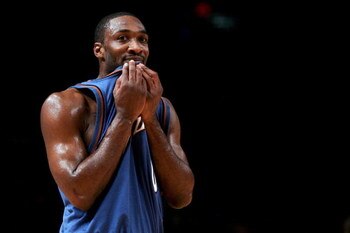 NEW YORK - NOVEMBER 15:  Gilbert Arenas #0 of the Washington Wizards reacts after being called for a foul against the New York Knicks on November 15, 2006 at Madison Square Garden in New York City.  NOTE TO USER: User expressly acknowledges and agrees tha