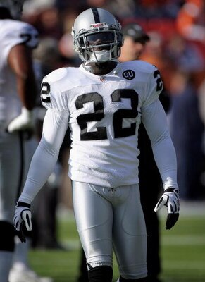 DENVER - NOVEMBER 23:  Cornerback Justin Miller #22 of the Oakland Raiders warma up prior to facing the Denver Broncos during week 12 NFL action at Invesco Field at Mile High on November 23, 2008 in Denver, Colorado.  (Photo by Doug Pensinger/Getty Images