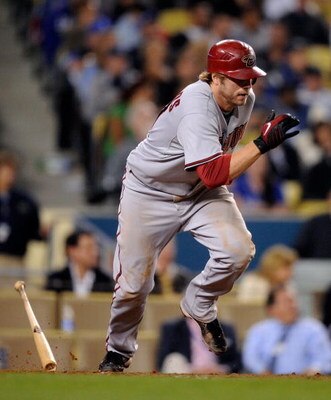 LOS ANGELES, CA - JUNE 01:  Mark Reynolds #27 of the Arizona Diamondbacks runs to first base after hitting into a force out to score Gerardo Parra from third base against the Los Angeles Dodgers  in the eight inning of the baseball game at Dodger Stadium 