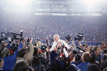 STANFORD, CA - JANUARY 20:  Head coach Bill Walsh of the San Francisco 49ers enjoys a victory ride on the field after defeating the Miami Dolphins 38-16 in Super Bowl XIX at Stanford Stadium on January 20, 1985 in Stanford, California.  (Photo by George R