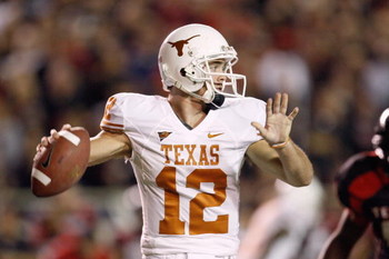 LUBBOCK,TEXAS - NOVEMBER 1: Quarterback Colt McCoy #12 of the Texas Longhorns looks to pass the ball during the game against the Texas Tech Red Raiders on November 1, 2008 at Jones Stadium in Lubbock, Texas. (Photo by: Jamie Squire/Getty Images)
