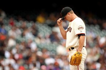 SAN FRANCISCO - MAY 02:  Pitcher Matt Cain #18 of the San Francisco Giants reacts after Brad Hawpe #11 of the Colorado Rockies hit a solo home run in the sixth inning on May 2, 2009 at AT&T Park in San Francisco, California.  (Photo by Ezra Shaw/Getty Ima