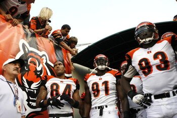 CINCINNATI - AUGUST 18:  T.J. Houshmandzadeh #84, Robert Geathers #91 and Rashad Jeanty #93 of the Cincinnati Bengals get ready to take the field before a preseason NFL game against the New Orleans Saints on August 18, 2007 at Paul Brown Stadium in Cincin