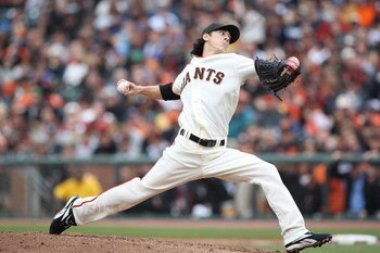 SAN FRANCISCO - APRIL 07:  Tim Lincecum #55 of the San Francisco Giants pitches against the Milwaukee Brewers during Opening Day of the Major League Baseball season on April 7, 2009 at AT&T Park in San Francisco, California.  (Photo by Jed Jacobsohn/Getty