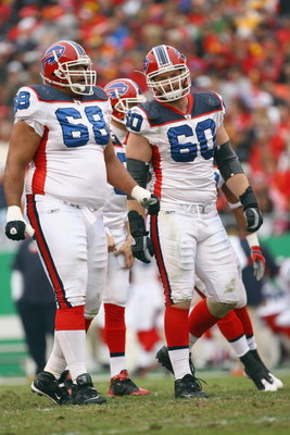 KANSAS CITY, MO - NOVEMBER 23: Langston Walker #68 and Brad Butler #60 of the Buffalo Bills walk on the field during the game against the Kansas City Chiefs on November 23, 2008 at Arrowhead Stadium in Kansas City, Missouri. (Photo by Jamie Squire/Getty