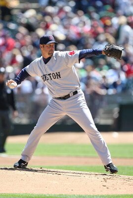 OAKLAND, CA - APRIL 15:  Tim Wakefield #49 of the Boston Red Sox pitches against the Oakland Athletics during a Major League Baseball game on April 15, 2009 at the Oakland Coliseum in Oakland, California.  (Photo by Jed Jacobsohn/Getty Images)