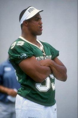 29 Aug 1998: Defensive end Dimitrius Underwood #99 of the Michigan State Spartans looks on during the Black Coaches Association Football Classic game against the Colorado State Rams at the Spartan Stadium in East Lansing, Michigan. The Rams defeated the