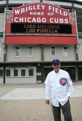 CHICAGO - OCTOBER 17: New manager Lou Piniella of the Chicago Cubs poses in front of the marquee following an introductory press conference on October 17, 2006 at Wrigley Field in Chicago, Illinois. (Photo by Jonathan Daniel/Getty Images) 