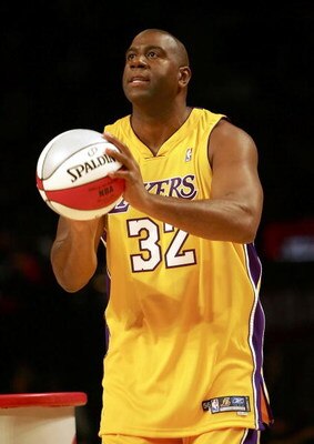 HOUSTON - FEBRUARY 18:  Magic Johnson of the Los Angeles team gets ready to shoot in the Radio Shack Shooting Stars competition during NBA All-Star Weekend at the Toyota Center on February 18, 2006 in Houston, Texas.  NOTE TO USER: User expressly acknowle