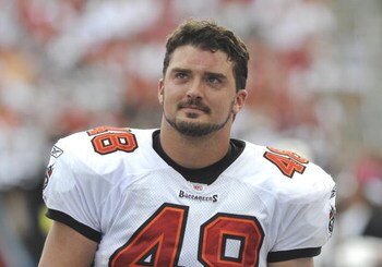 TAMPA, FL - OCTOBER 12: Long snapper Andrew Economos #48 of  the Tampa Bay Buccaneers watches play against the Carolina Panthers at Raymond James Stadium on October 12, 2008 in Tampa, Florida.  (Photo by Al Messerschmidt/Getty Images) 