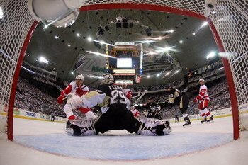 PITTSBURGH - JUNE 04:  Goaltender Marc-Andre Fleury 29 of the Pittsburgh Penguins saves a shot on goal by the Detroit Red Wings during Game Four of the 2009 NHL Stanley Cup Finals on June 4, 2009 at Mellon Arena in Pittsburgh, Pennsylvania.  (Photo by Bru