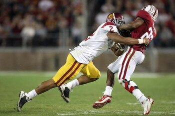 STANFORD - NOVEMBER 15:  Taylor Mays #2 of USC Trojans tackles Delano Howell #26 of the Stanford Cardinals at Stanford Stadium on November 15, 2008 in Stanford, California. (Photo by: Jed Jacobsohn/Getty Images)