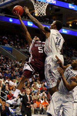 PHILADELPHIA - MARCH 21:  Dash Harris #5 of the Texas A&M Aggies shoots against Hasheem Thabeet #34 of the Connecticut Huskies during the second round of the NCAA Division I Men's Basketball Tournament at the Wachovia Center on March 21, 2009 in Philadelp