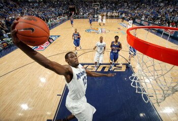 MEMPHIS, TN - MARCH 14:  Tyreke Evans #12 of the Memphis Tigers dunks in a game against the Tulsa Golden Hurricane during the Championship of the Conference USA Basketball Tournament at FedExForum on March 14, 2009 in Memphis, Tennessee. Memphis beat Tuls