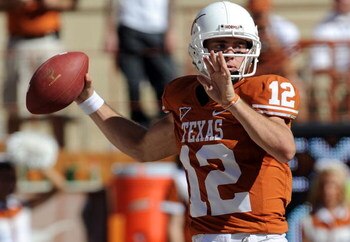 AUSTIN, TX - OCTOBER 25:  Quarterback Colt McCoy #12 of the Texas Longhorns drops back to pass against the Oklahoma State Cowboys at Texas Memorial Stadium on October 25, 2008 in Austin, Texas.  (Photo by Ronald Martinez/Getty Images)