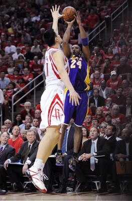 HOUSTON - MAY 08:  Guard Kobe Bryant #24 of the Los Angeles Lakers takes a shot against Yao Ming of the Houston Rockets in Game Three of the Western Conference Semifinals during the 2009 NBA Playoffs at Toyota Center on May 8, 2009 in Houston, Texas. NOTE