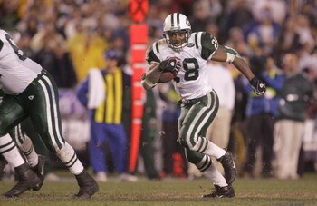 SAN DIEGO - JANUARY 8:  Running back Curtis Martin #28 of the New York Jets runs with the ball against the San Diego Chargers during the AFC wild-card game at Qualcomm Stadium on January 8, 2005 in San Diego, California.  The Jets defeated the Chargers 20