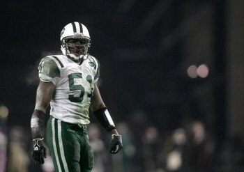 FOXBORO, MA - DECEMBER 4: Jonathan Vilma #51 of the New York Jets walks on the field during the game against the New England Patriots at Gillette Stadium on December 4, 2005 in Foxboro, Massachusetts. (Photo by Nick Laham/Getty Images)