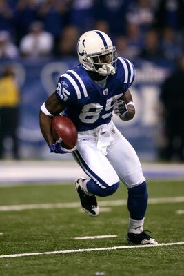 INDIANAPOLIS - NOVEMBER 02:  Pierre Garcon #85 of the Indianapolis Colts returns the ball against the New England Patriots at Lucas Oil Stadium on November 2, 2008 in Indianapolis, Indiana.  (Photo by Andy Lyons/Getty Images)