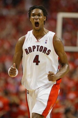 TORONTO,ON - APRIL 24:  Chris Bosh #4 of the Toronto Raptors shows his excitment against the Orlando Magic in Game 3 of the Eastern Conference Quarterfinals on April 24, 2008 at the Air Canada Centre in Toronto, Ontario. The Raptors defeated the Magic 108