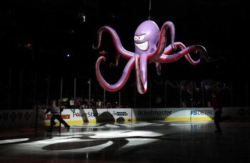 DETROIT - JUNE 06:  A giant octopus is lowered to the ice during pregame before the Detroit Red Wings face the Pittsburgh Penguins during Game Five of the 2009 NHL Stanley Cup Finals at Joe Louis Arena on June 6, 2009 in Detroit, Michigan.  (Photo by Harr