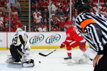 DETROIT - JUNE 06:  Goaltender Marc-Andre Fleury #29 of the Pittsburgh Penguins gives up a goal to Valtteri Filppula #51 of the Detroit Red Wings during Game Five of the 2009 NHL Stanley Cup Finals at Joe Louis Arena on June 6, 2009 in Detroit, Michigan. 