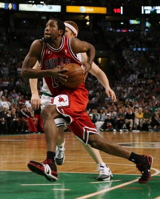 BOSTON - MAY 02:  John Salmons #15 of the Chicago Bulls heads to the net as Brian Scalabrine #44 of the Boston Celtics defends in Game Seven of the Eastern Conference Quarterfinals during the 2009 NBA Playoffs at TD Banknorth Garden on May 2, 2009 in Bost