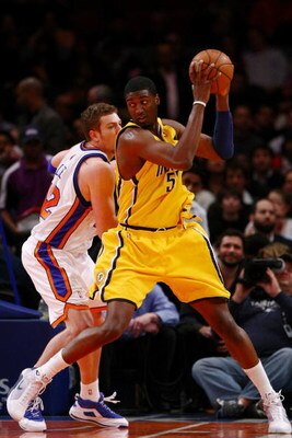 NEW YORK - FEBRUARY 23:  Roy Hibbert #55 of the Indiana Pacers goes up against David Lee #42 of the New York Knicks during the game at Madison Square Garden February 23, 2009 in New York City.  The Knicks won 123-119.  NOTE TO USER: User expressly acknowl