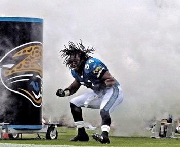 Jacksonville Jaguars linebacker Mike Peterson  enters Alltel Stadium during pre-game introductions  against the Denver Broncos October 2, 2005 in Jacksonville. The Broncos defeated the Jaguars 20 - 7.  (Photo by Al Messerschmidt/Getty Images)