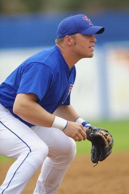 DUNEDIN, FL - MARCH 3:  Third Baseman Eric Hinske #11 of the Toronto Bluejays readies for the play against the Philadelphia Phillies during the spring training game at Dunedin Stadium  in Dunedin, Florida on March 3, 2002.  The Phillies defeated the Bluej