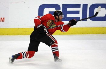 CHICAGO - MARCH 29: Martin Havlat #24 of the Chicago Blackhawks fires a shot against the Vancouver Canucks on March 29, 2009 at the United Center in Chicago, Illinois. The Canucks defeated the Blackhawks 4-0. (Photo by Jonathan Daniel/Getty Images)