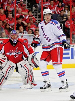 WASHINGTON - APRIL 15:  Nik Antropov #80 of the New York Rangers sets up a second period goal against Jose Theodore #60 of the Washington Capitals during Game One of the Eastern Conference Quarterfinals of the 2009 NHL Stanley Cup Playoffs on April 15, 20