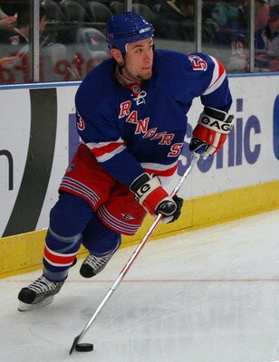 NEW YORK - MARCH 24:  Derek Morris #53 of the New York Rangers skates against the Minnesota Wild on March 24, 2009 at Madison Square Garden in New York City. The Rangers defeated the Wild 3-2.  (Photo by Jim McIsaac/Getty Images)