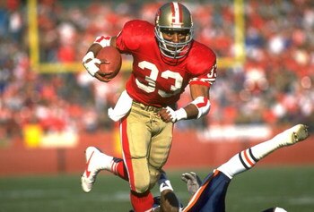 24 DEC 1989:  SAN FRANCISCO 49ERS RUNNING BACK ROGER CRAIG CARRIES THE FOOTBALL DURING THE 49ERS 26-0 WIN OVER THE CHICAGO BEARS AT CANDLESTICK PARK IN SAN FRANCISCO, CALIFORNIA.