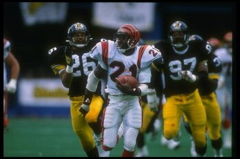 8 Oct 1989: Running back James Brooks of the Cincinnati Bengals (center) runs with the ball during a game against the Pittsburgh Steelers at Three Rivers Stadium in Pittsburgh, Pennsylvania. The Bengals won the game, 26-16.